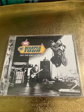 #2156**Vans Black & White Live Concert CD with Yellow and Red Logo
